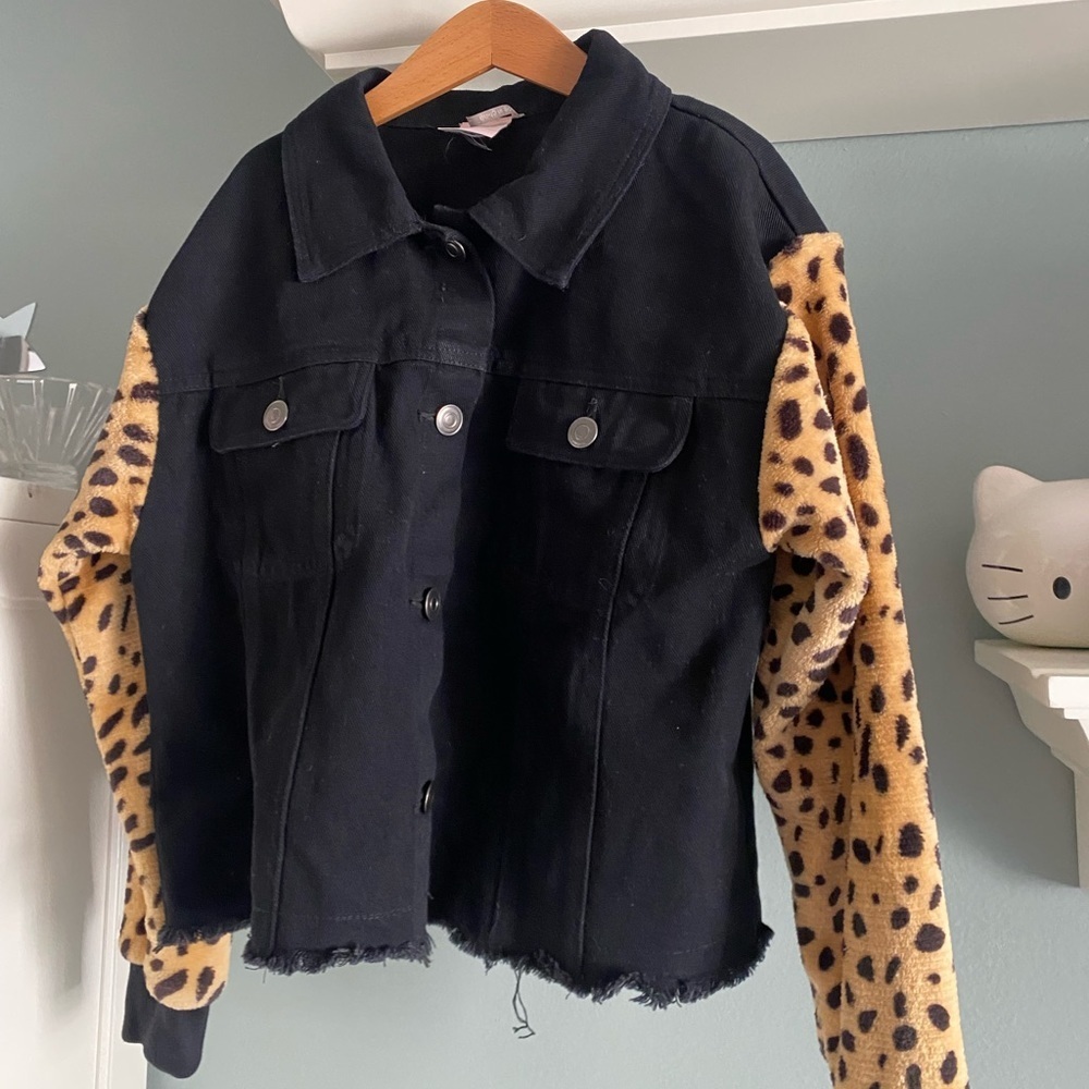 For all seasons black denim jacket with animal print sleeves